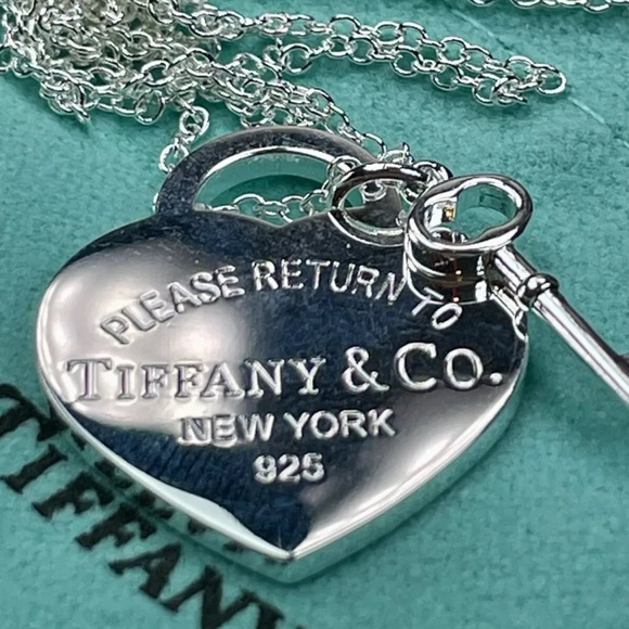 Authentic Tiffany & Co. Silver Heart Stamped Pendant and Key Necklace. - Picture 13 of 16